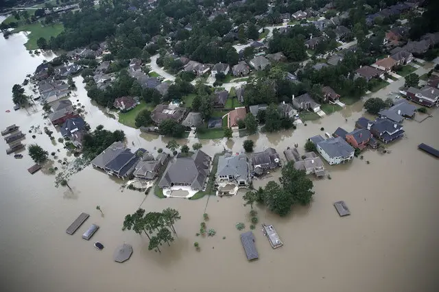Flooded homes are shown near Lake Houston following Hurricane Harvey.